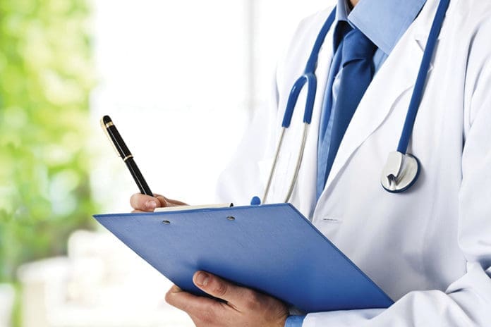 Doctor with clipboard