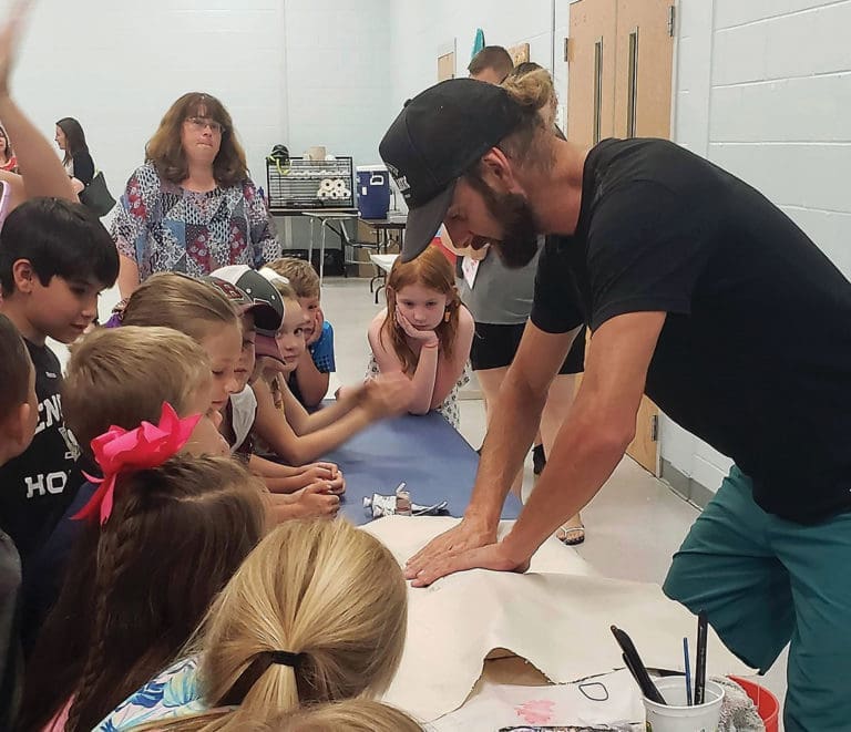 Hometown Hero Harley: Spreading Love with a Brush