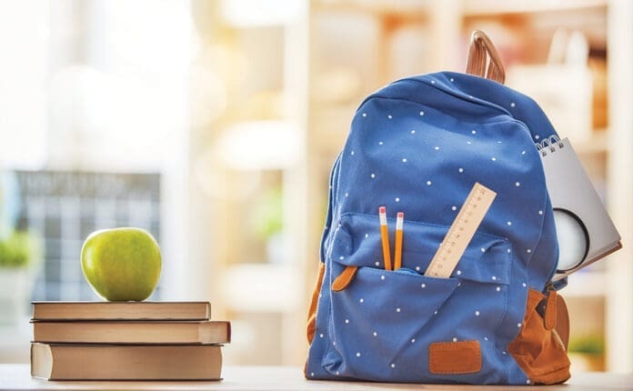 Apple, pile of books and pencils Apple, pile of books and pencils