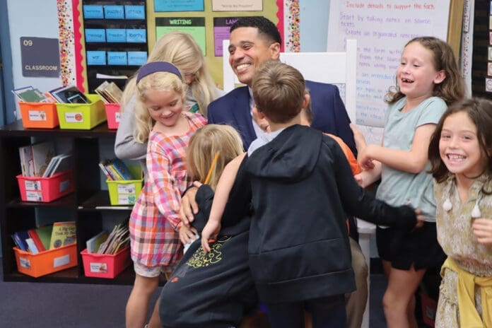 Superintendent Marcus Chambers and kids Superintendent Marcus Chambers and kids