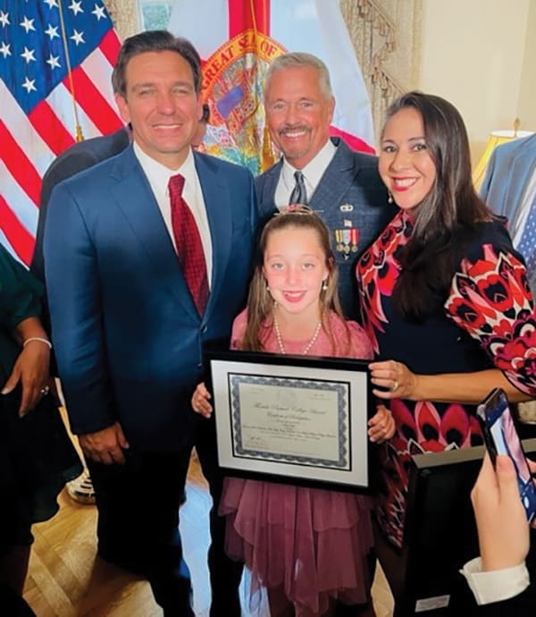 BB Norah Hall FamilyandGovernorDeSantis_WINNERof2023HispanicHertigageMonthEssayContest_10.10.23