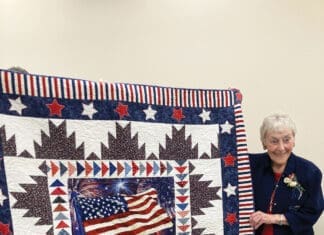 Area Local Awarded Quilt of Valor Constance Newhouse being awarded The Quilt of Valor