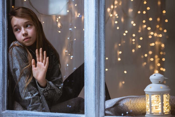Emerald Coast Advocacy Center girl in window