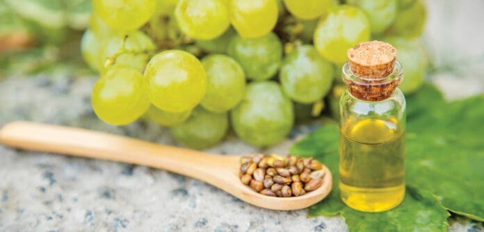 grape seed oil in a small jar. Selective focus.nature