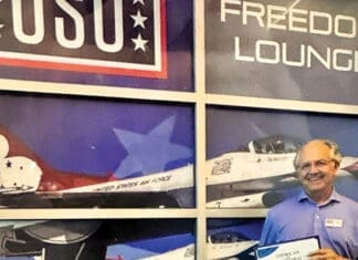 Mid-Bay Rotarian Henry Snider USO Vol of Year