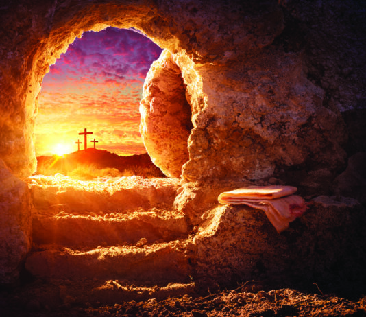 Empty Tomb With Shroud And Crucifixion At Sunrise - Risen Resurrection