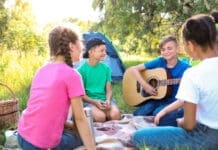 Group of children resting at summer camp