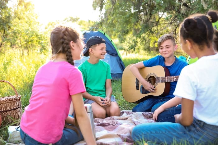Group of children resting at summer camp Group of children resting at summer camp