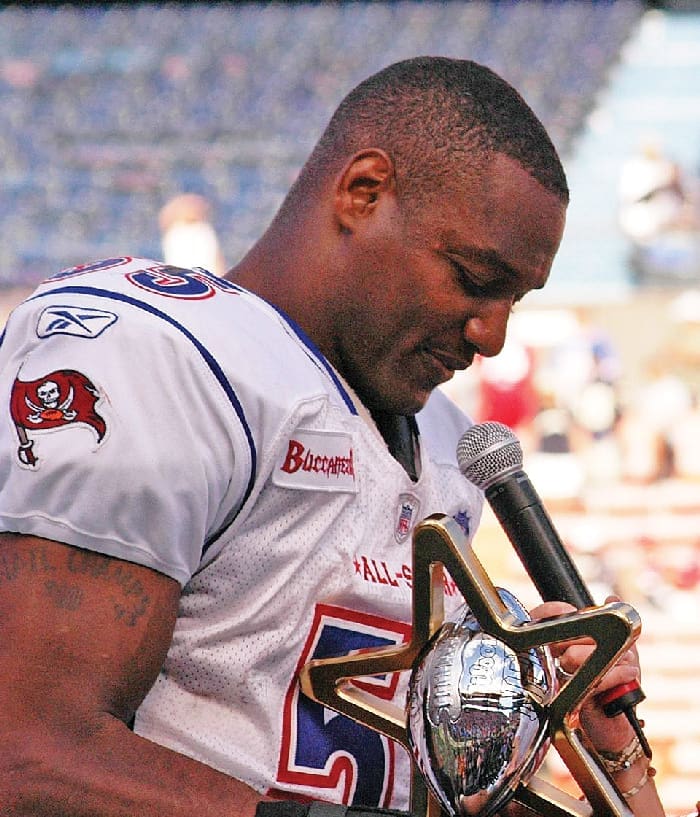 Derrick Brooks with 2006 Pro Bowl MVP trophy 060210 N 4856G 129