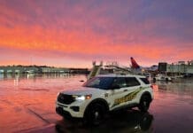okaloosa sheriff car at sunset