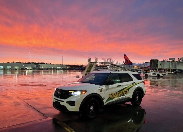 okaloosa sheriff car at sunset